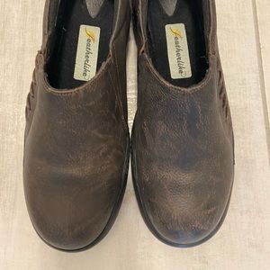 Brown stylish safety shoes. Wore once selling because I have no need for it.